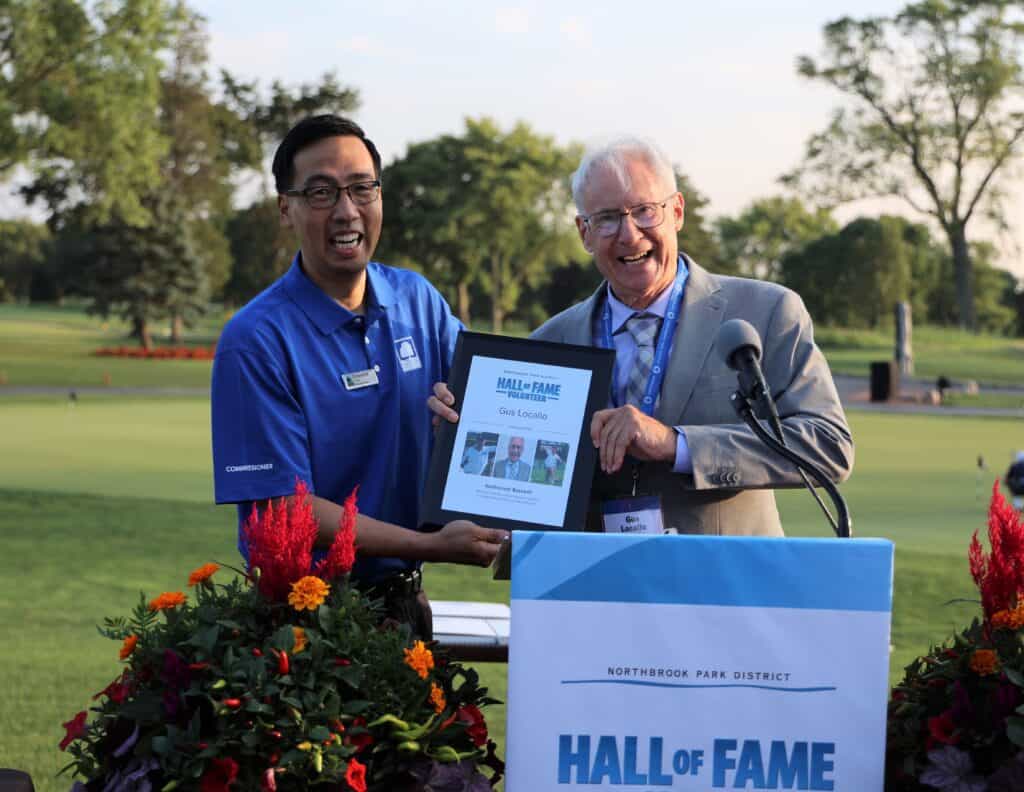 Park Board of Commissioner Edward Chao with 2022 Volunteer Hall of Fame inductee Gus Locallo at the 2023 Hall of Fame Induction Ceremony.